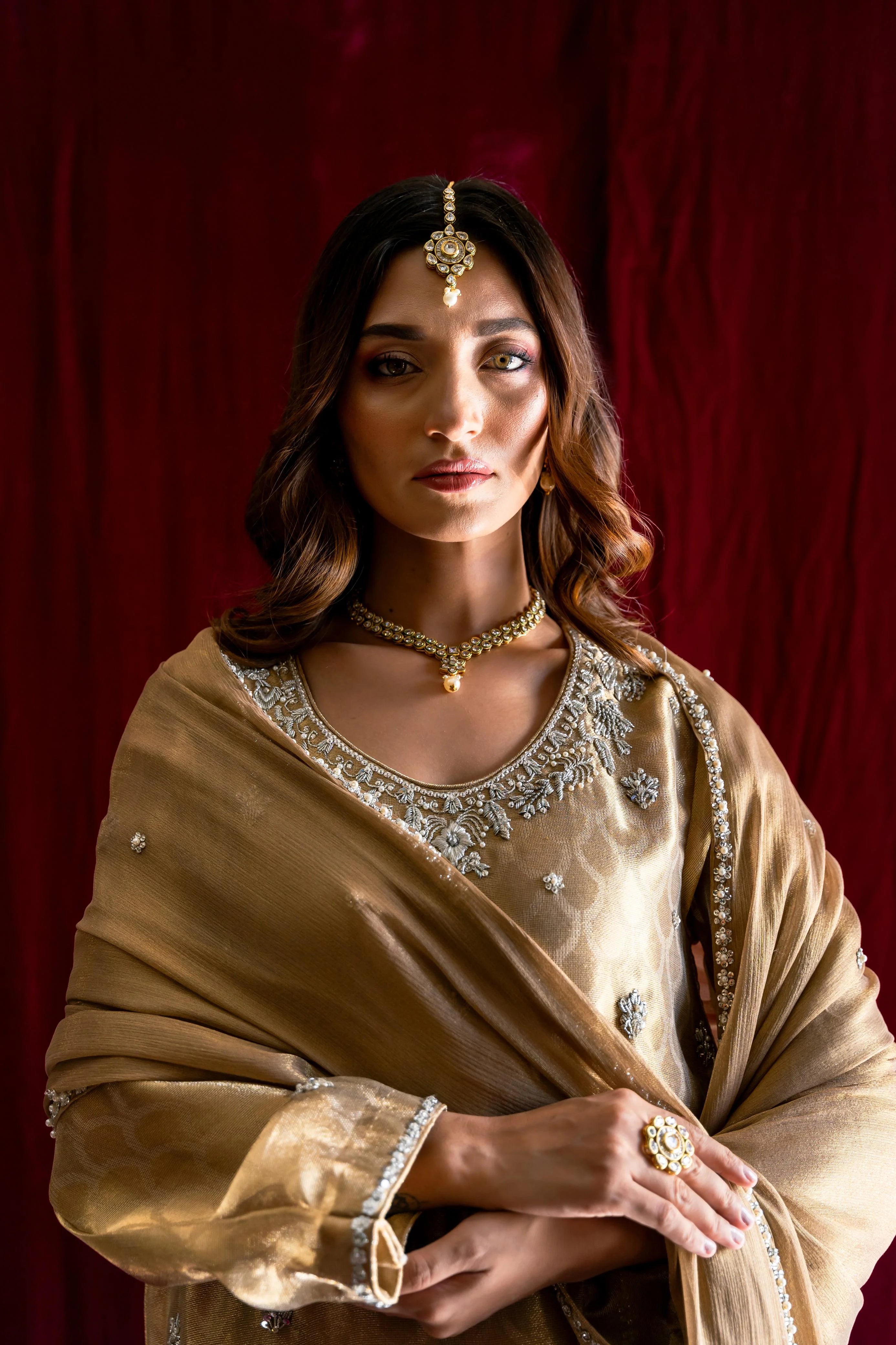 REIGNING IN GOLD
